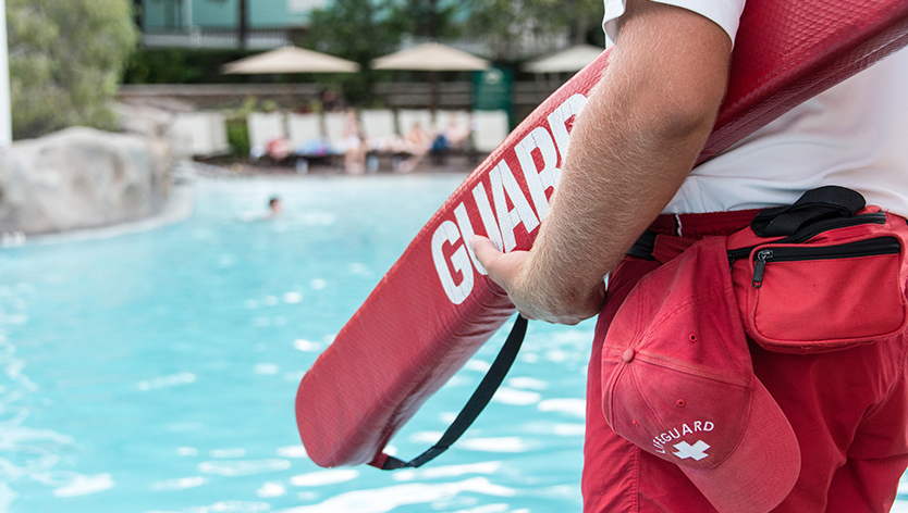 Lifeguard on standby at a pool